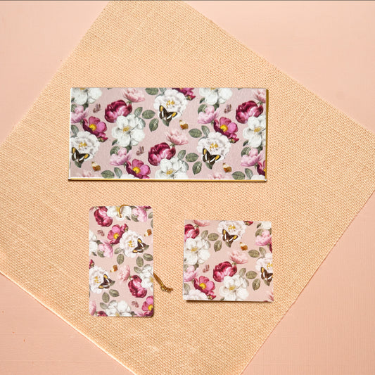A money envelope, hanging tag and folded card, all in the same blue and white tile print
