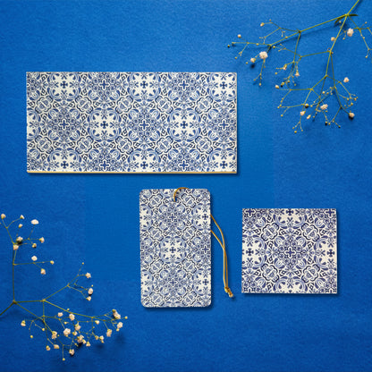 A money envelope, hanging tag and folded card, all in the same blue and white tile print