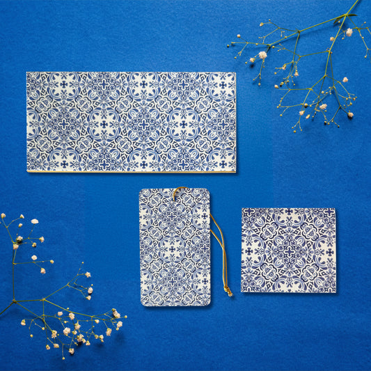 A money envelope, hanging tag and folded card, all in the same blue and white tile print