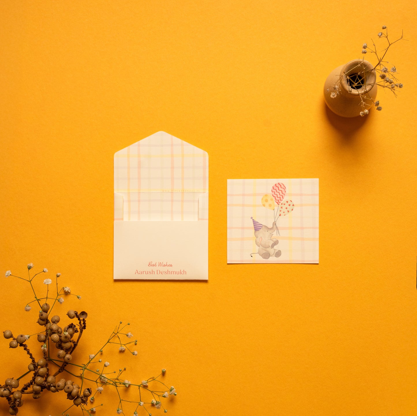 Elphie kids’ notecard; a card with a playful Elephant illustration on a checkered background paired with a matching small envelope