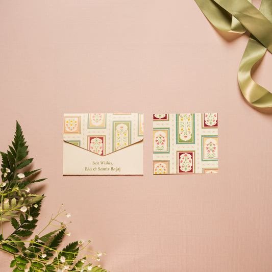 Isola notecard; a card with  delicate, Mughal inspired florals within arches with a floral border paired with a matching small envelope
