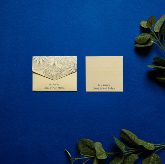 Juniper notecard; a card with line drawn palm trees on a teal background paired with a matching small envelope