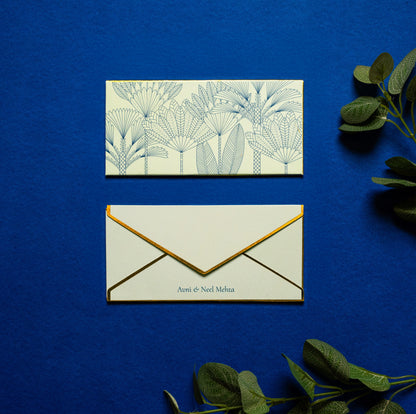 Juniper money envelope; box envelope with line drawn palm trees on a teal background and gold foiled edges
