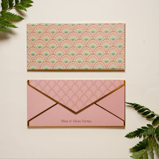 Palmera money envelope; box envelope with a repeating pattern of pink arches with palms and gold foil edges
